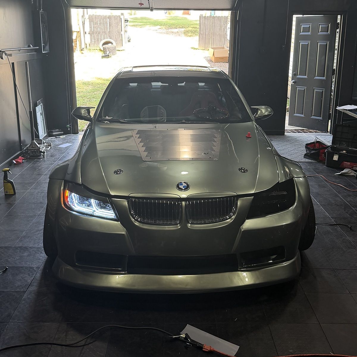 Widebody BMW 3 Series wrapped in olive green
